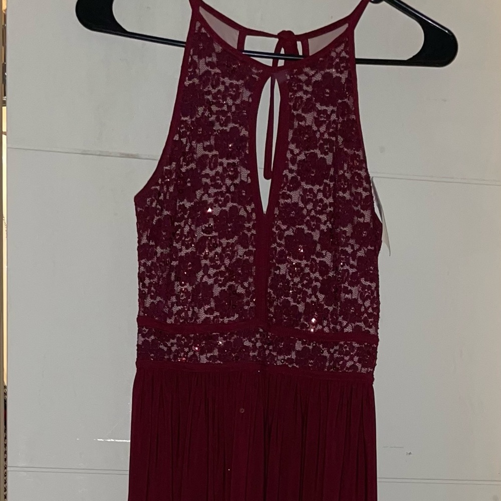 Never worn new with tag, very good quality silky and heavy material.